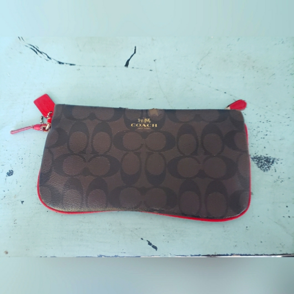 Coach lacquered leather pouch